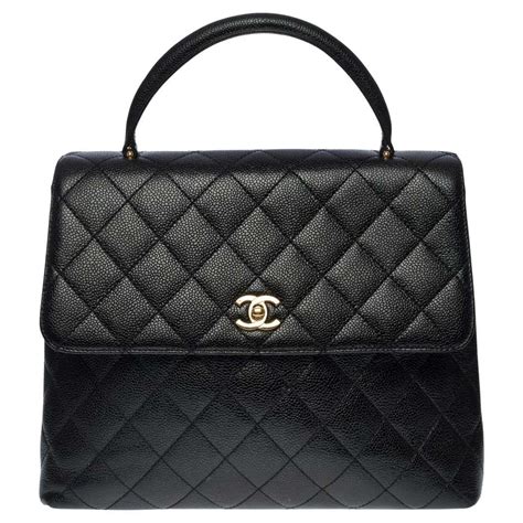 chanel cc quilted caviar bowler bag